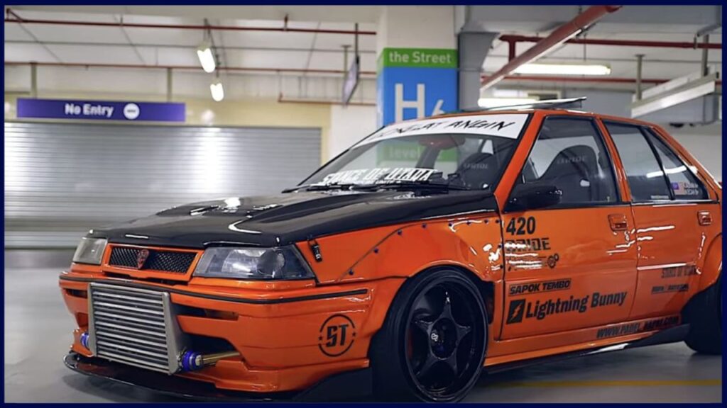 modified wira sedan orange black