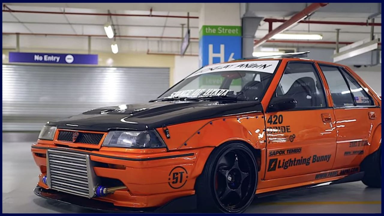 modified wira sedan orange black